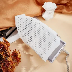Non stick iron soleplate protector with steam holes for easy ironing
